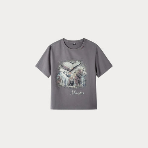 Gray t-shirt with a graphic design on a light gray background